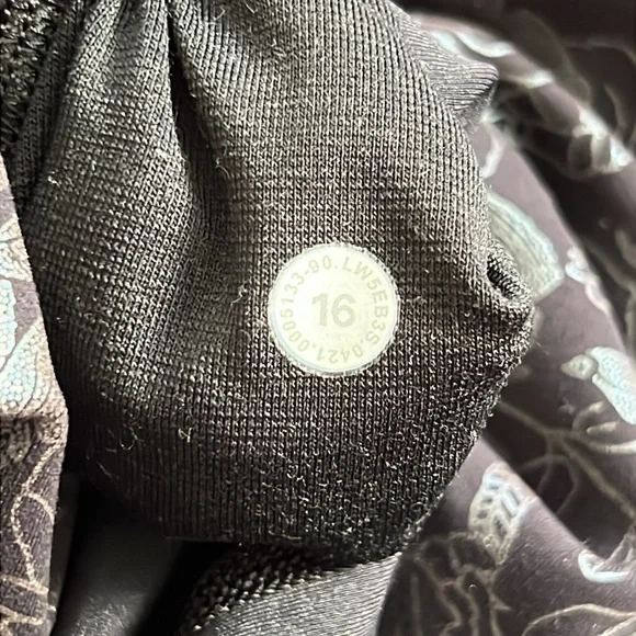Lululemon Wunder Train High-Rise Tight 25" *Foil
Logo Flourish Black Iridescent - Picture 11 of 11